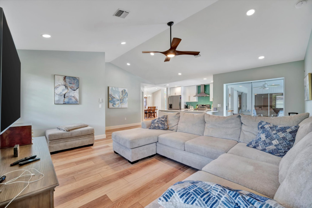 Whole-home remodeling project in Southwest Florida featuring an updated living room, kitchen, and open-concept interior