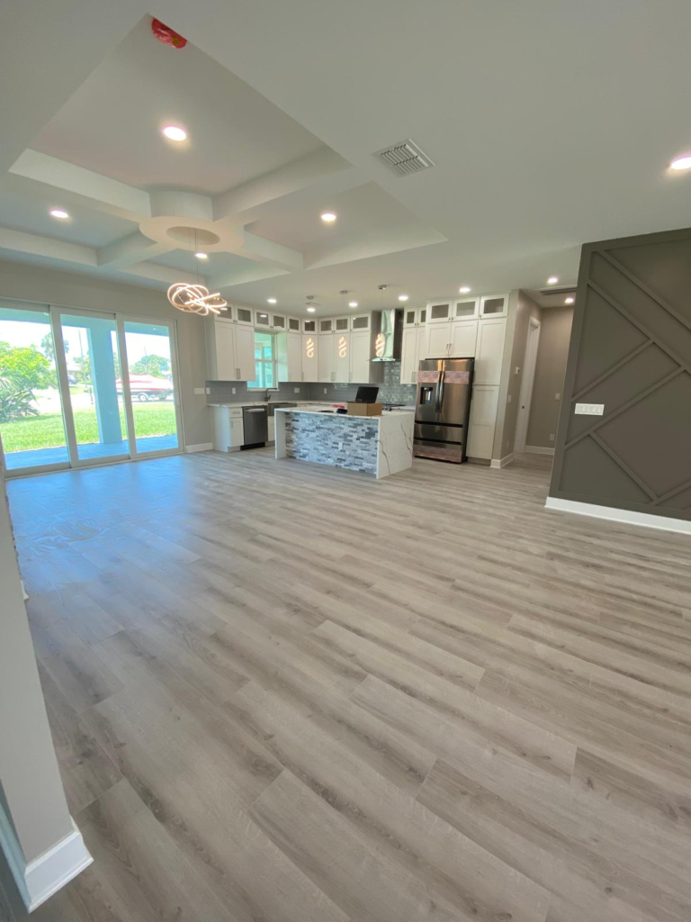 Whole-home remodeling project with open-concept kitchen and living room in Venice, Florida